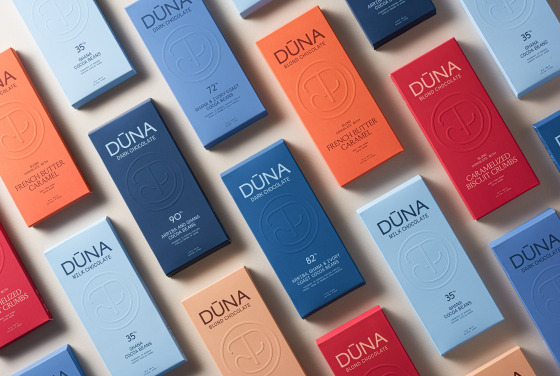 The DŪNA collection — all seven bars in a diagonal pattern