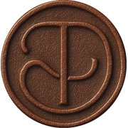 DŪNA debossed monogram on chocolate